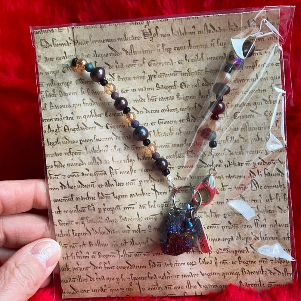 Genuine Pearl (and other beads) necklace.
